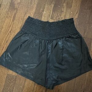 Black Mini Skirt with a Relaxed Fit and Textured Waistband